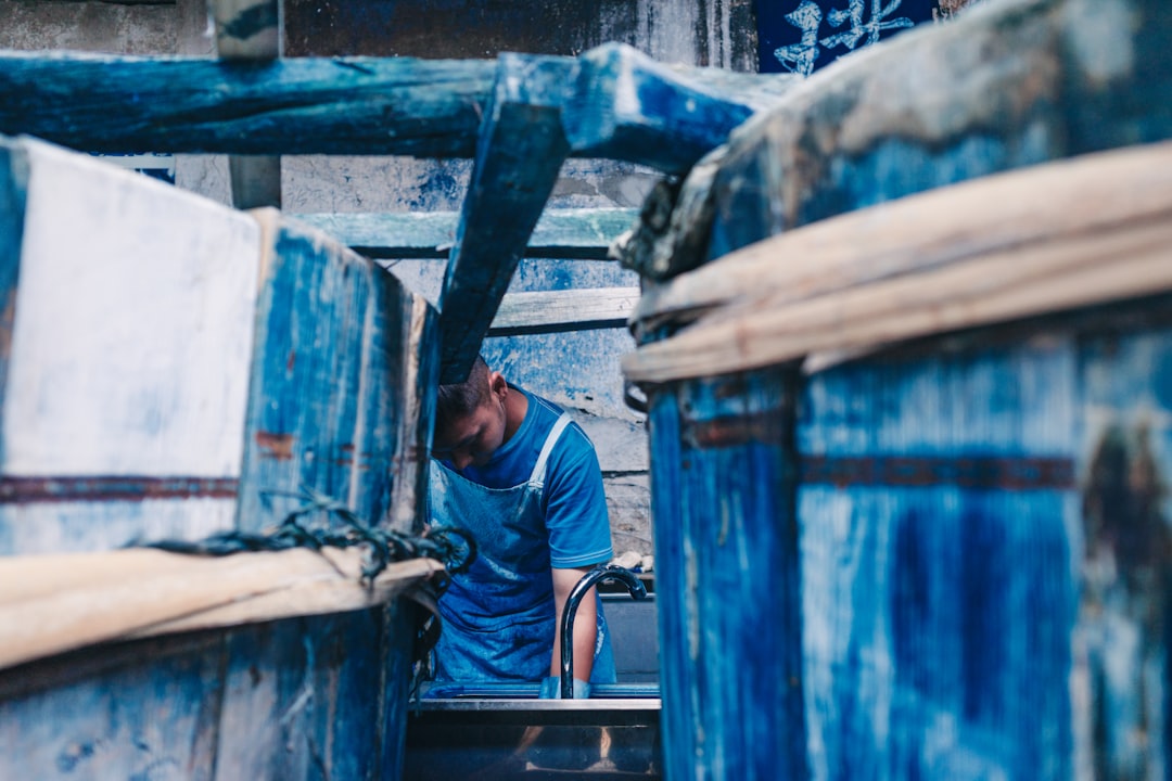 Historical textile manufacturing with an indigo theme